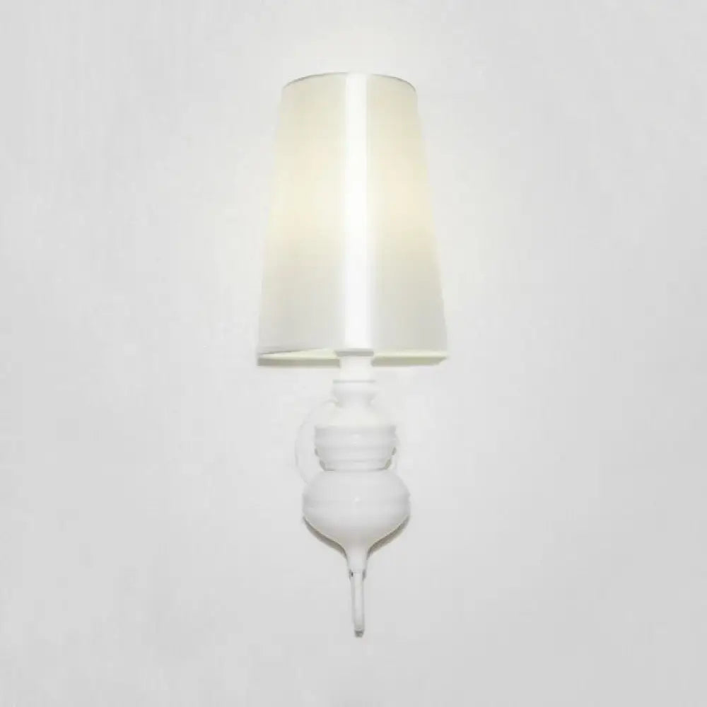 Contemporary white ceramic wall light with a tapered satin-finished lampshade and e26 e27 bulb base for bedroom use
