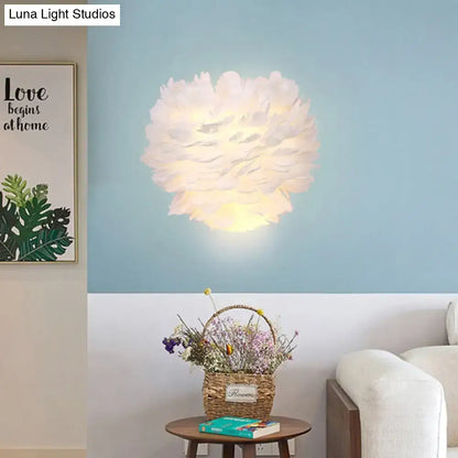 Contemporary white feather wall lamp with soft petal-like layered fabric design for bedroom sconce lighting