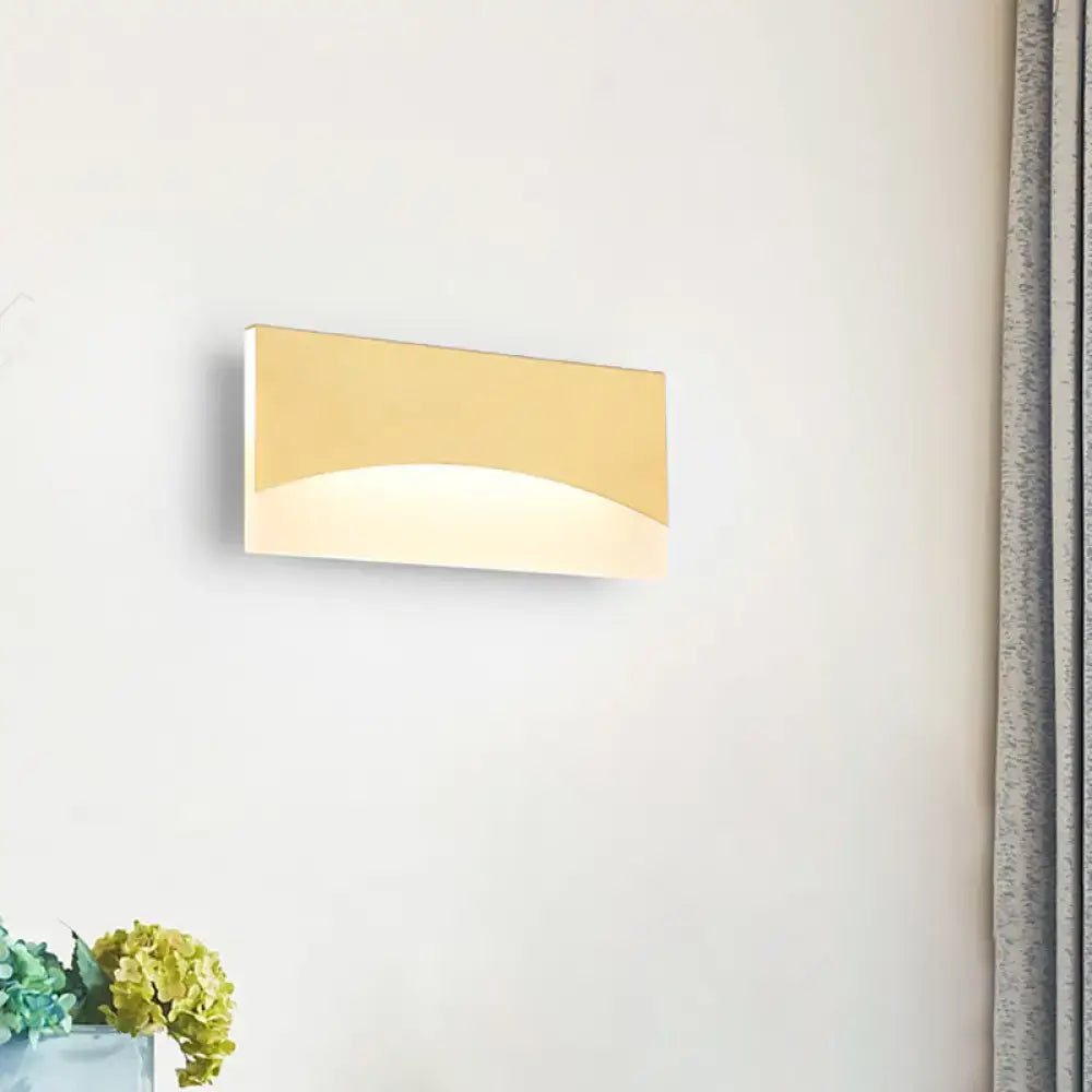 Contemporary white and gold bedroom sconce with gold finish, sleek curved design, fixture height and color temperature details