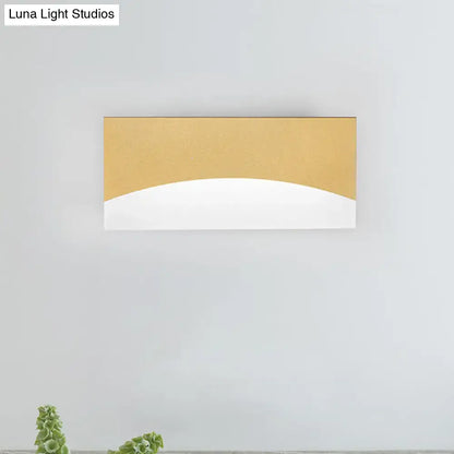 Contemporary rectangular wall sconce with gold and white finish, warm color temperature, ideal for bedroom lighting fixture height and width