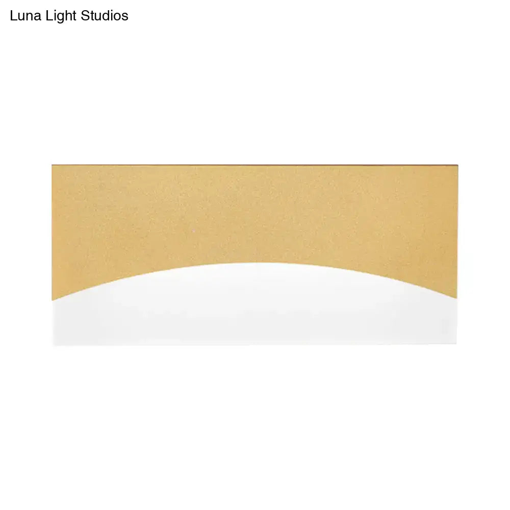 Contemporary white and gold bedroom sconce with brushed gold finish, smooth curved section, warm color temperature, fixture height and width