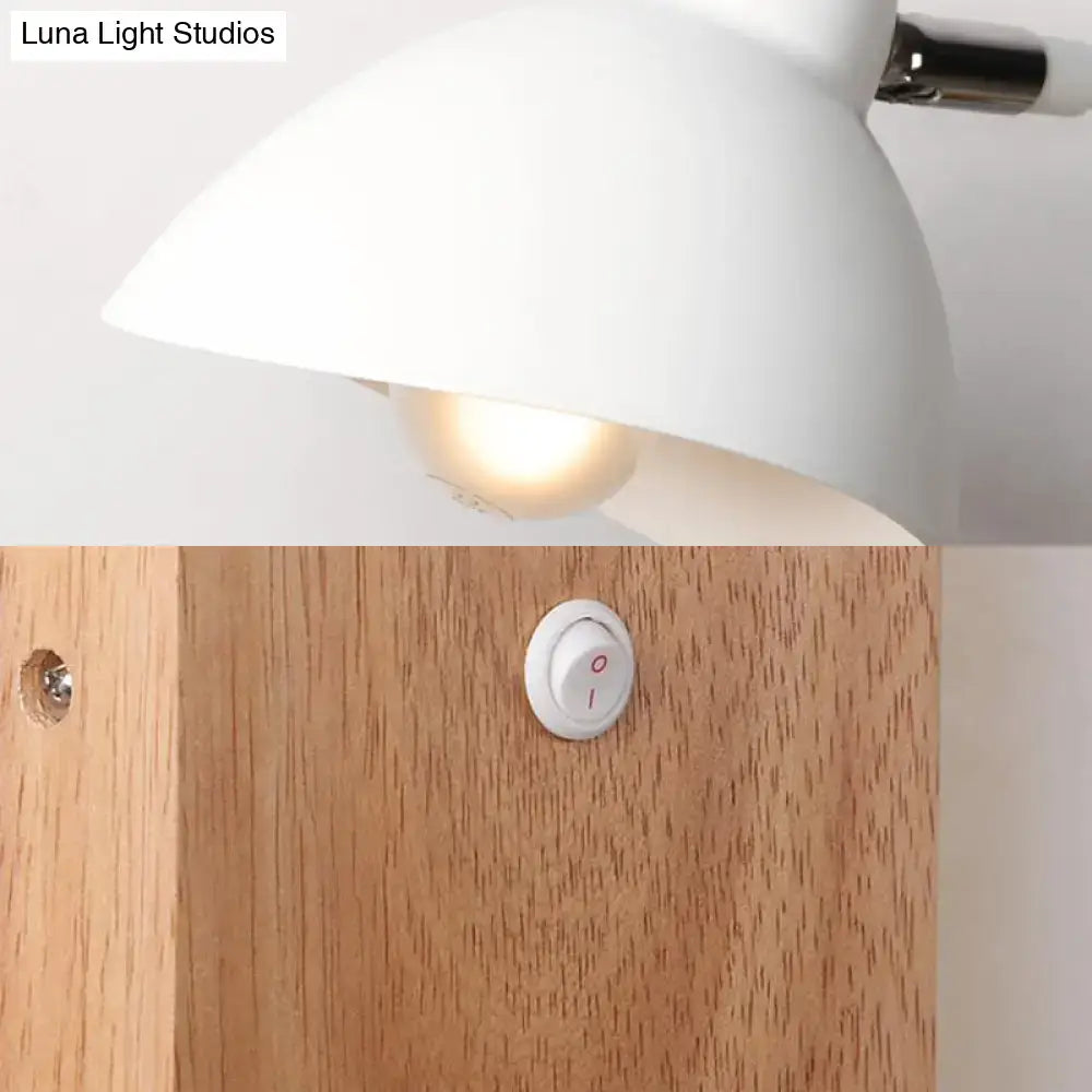 Contemporary white ceramic lampshade with metallic stem on a wood base metal wall mounted bedroom light with switch