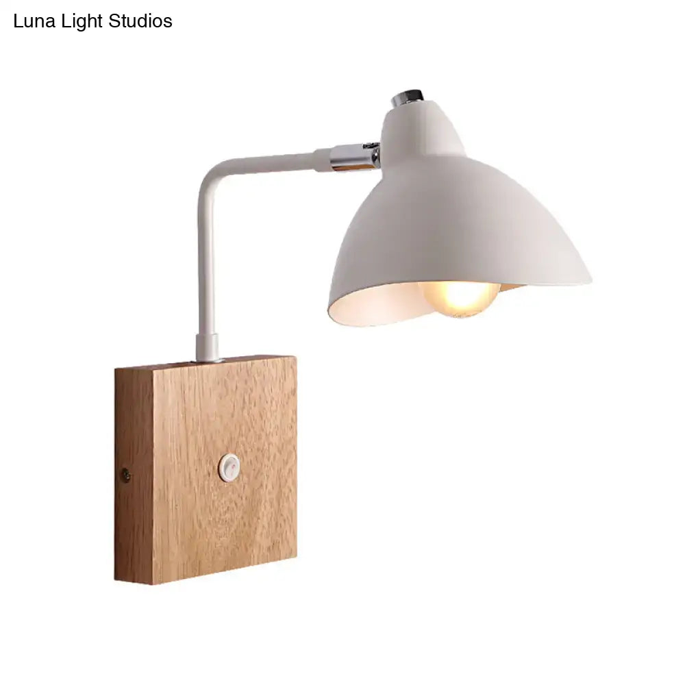 Contemporary white metal wall mounted lamp with wooden base featuring curved arm for bedroom lighting