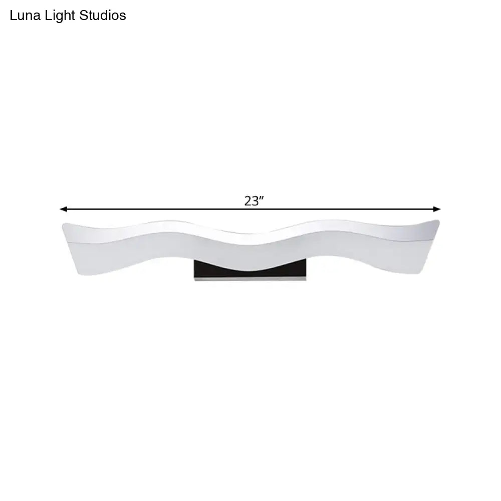 Contemporary white wave shaped 23 inch led wall mounted light with black base ideal for bathroom lighting