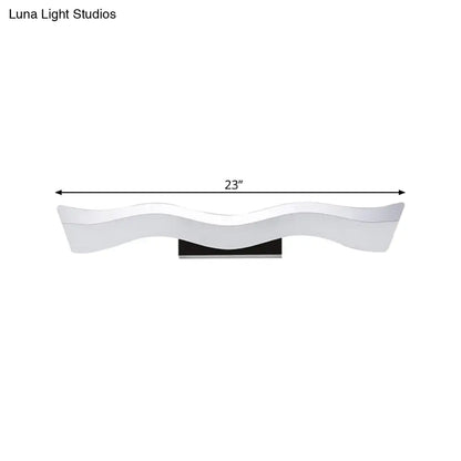 Contemporary white wave shaped 23 inch led wall mounted light with black base ideal for bathroom lighting