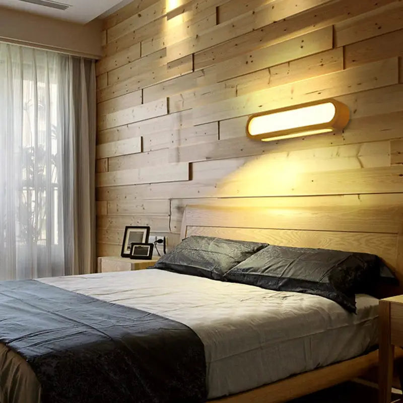 Contemporary led sconce vanity light with warm-toned wood rectangular design and soft diffused lighting for bedroom