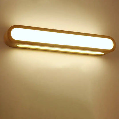 Contemporary led sconce vanity light with warm-toned led and matte gold rounded rectangular wood casing for bedroom