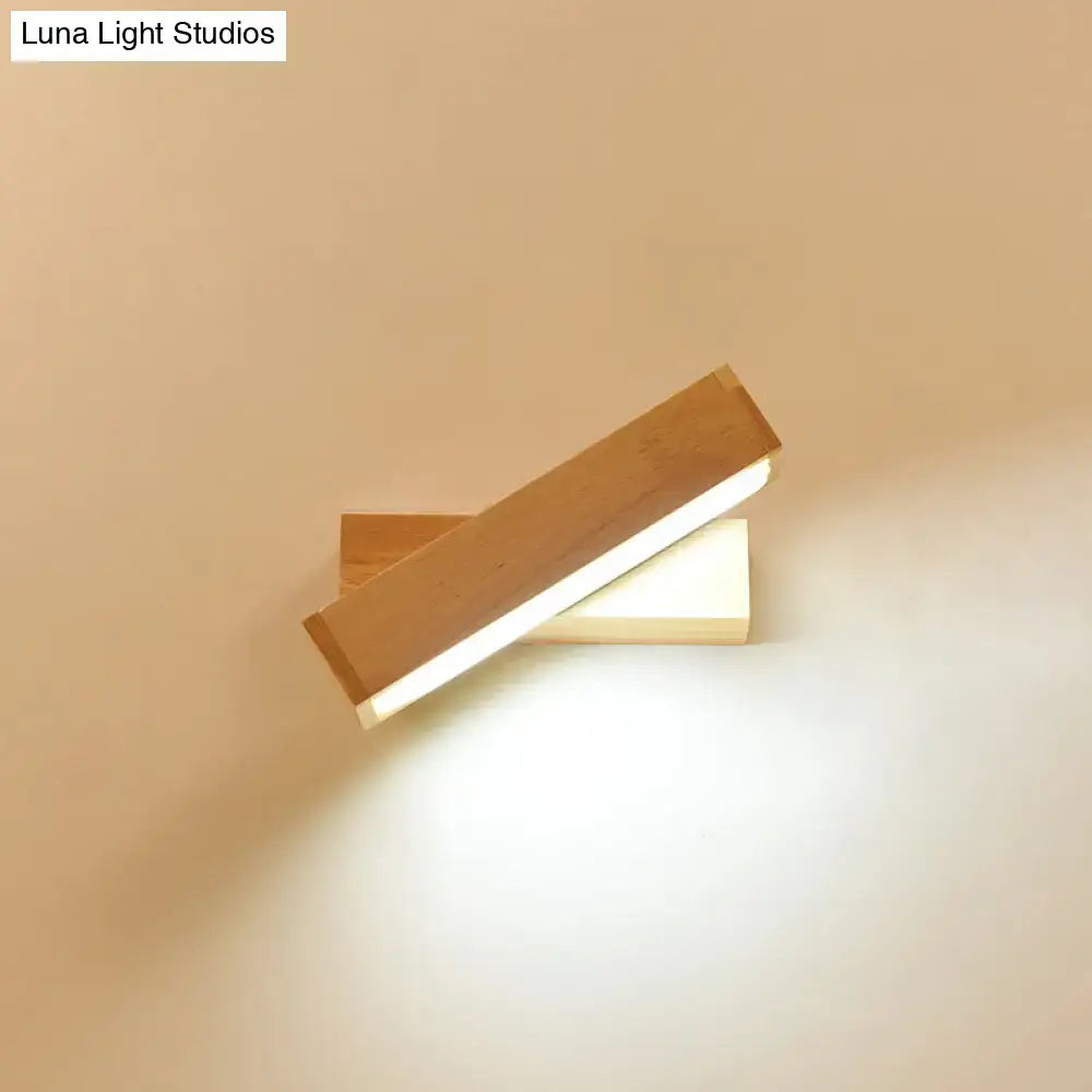 Contemporary minimalist wooden wall sconce with warm led light and acrylic shade for corridor lighting