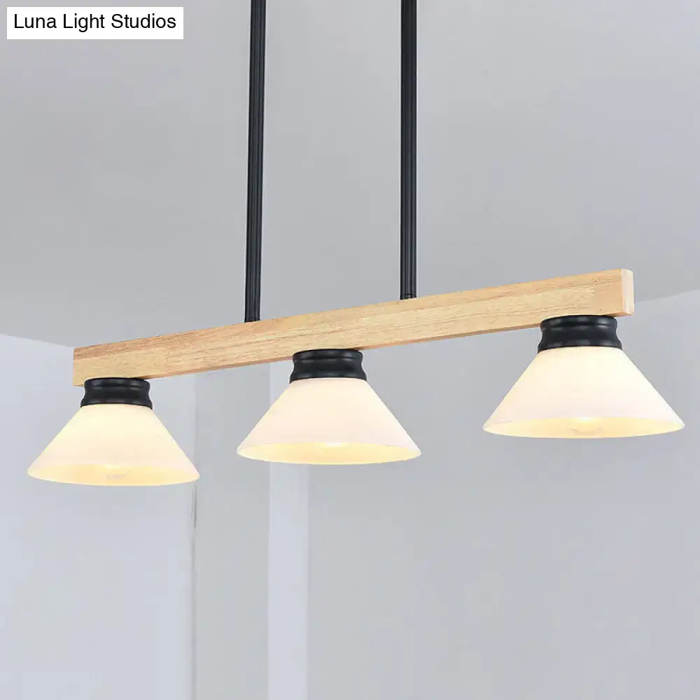 Contemporary wood linear island ceiling light with natural wood beam, gold black metal rods, and frosted glass shades