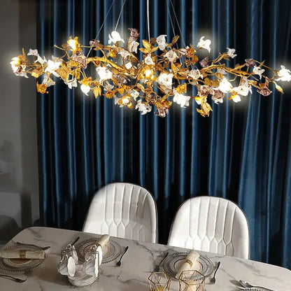 Gold-toned decorbites copper branch pendant chandelier with floral leaf designs and crystal accents for living room decor