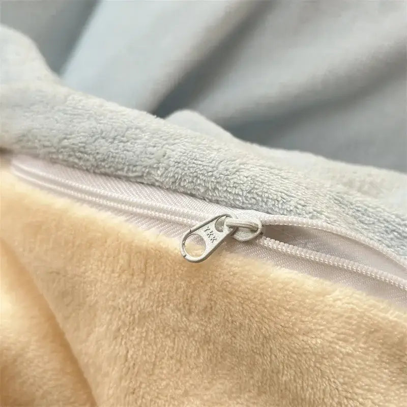 Beige plush fleece blanket with silver zipper paired with decorbites coral color blocked cream velvet duvet cover set