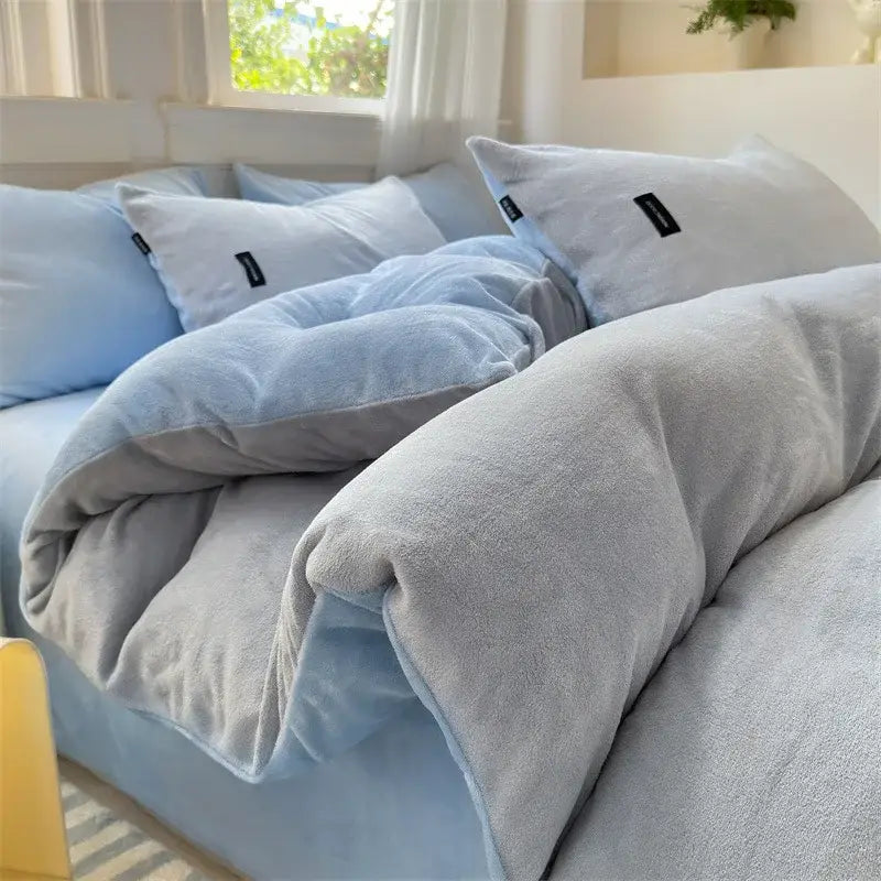 Soft plush two-toned light blue and gray velvet duvet cover from decorbites coral color blocked bedroom set