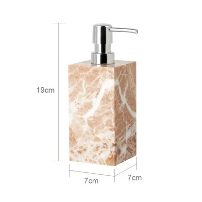 A rectangular beige and white marble soap dispenser with a chrome pump from decorbites coral pink marble bathroom set