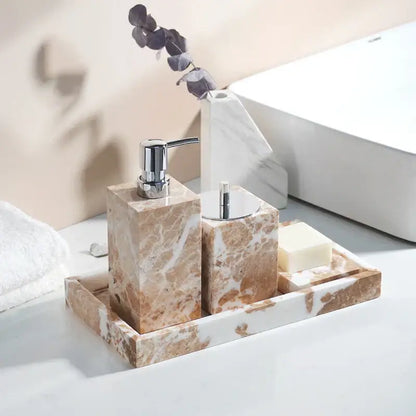 Beige marble bathroom set with chrome finish pump and lid complementing decorbites coral pink marble bathroom design