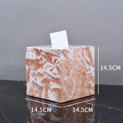 A coral pink marble bathroom tissue box with peach and white pattern measuring 14.5cm from decorbites coral pink set
