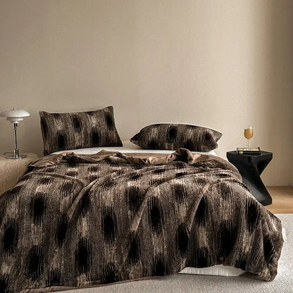 Brown and black ikat-patterned velvet throw blanket with faux rabbit plush texture for decorbites cosy faux living room decor