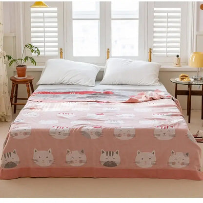 Pink cotton gauze boho throw blanket with cartoon cat faces in white and gray for bedroom decorbites cotton gauze