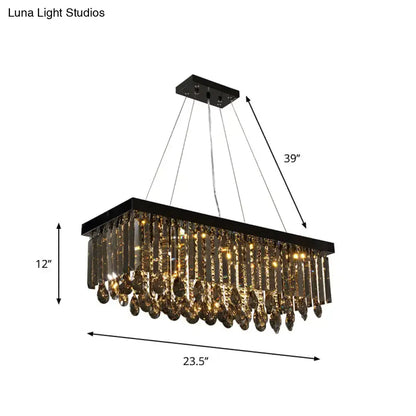 Black crystal island pendant light with cascading gold-toned crystal droplets for dining room decorbites