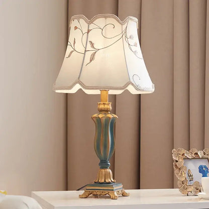 Elegant country pastoral desk lamp with cream embroidered floral shade and teal gold ornate base by decorbites
