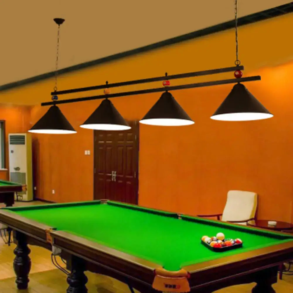 Black conical pendant bar island lighting fixture with chain cord length suspended above dark green pool table balls