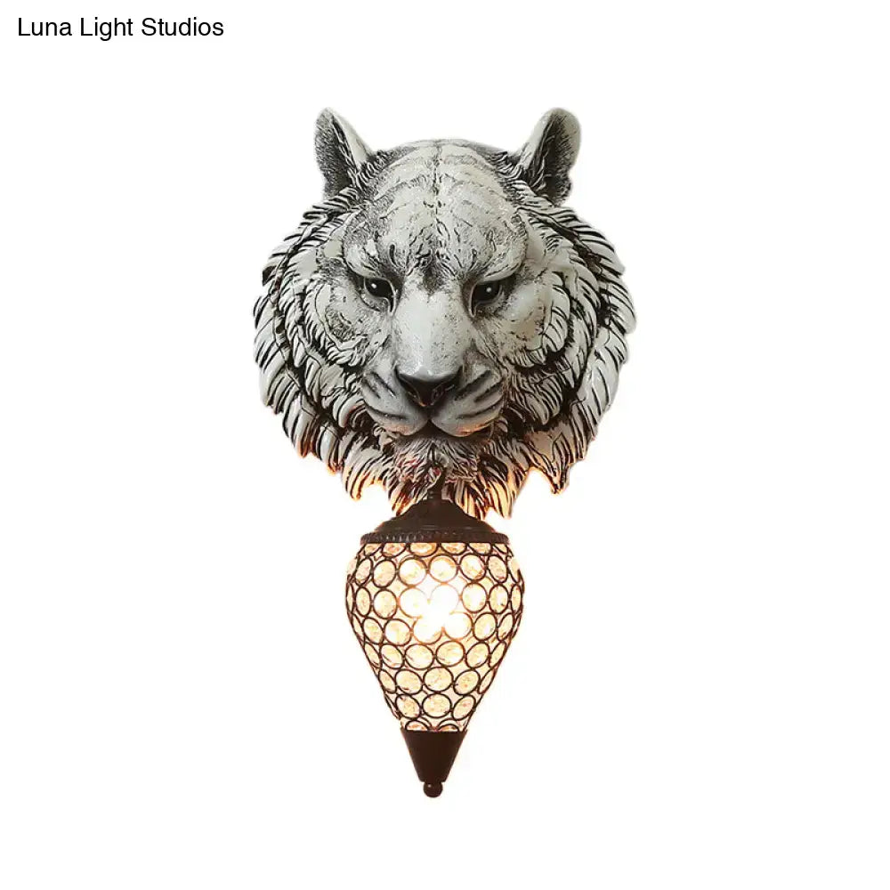Antique white tiger head wall sconce with clear crystal shade featuring mosaic glass for bedroom lighting