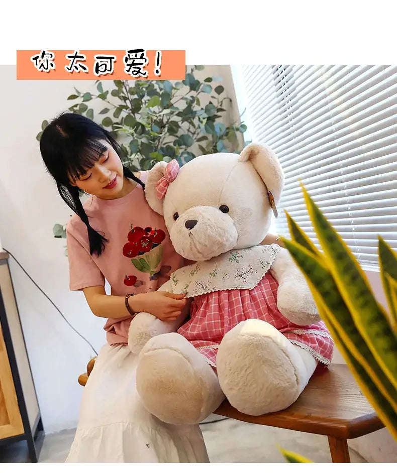 Cream-colored plush couple bear wearing a pink and white checkered dress with lace trim from decorbites plush toys