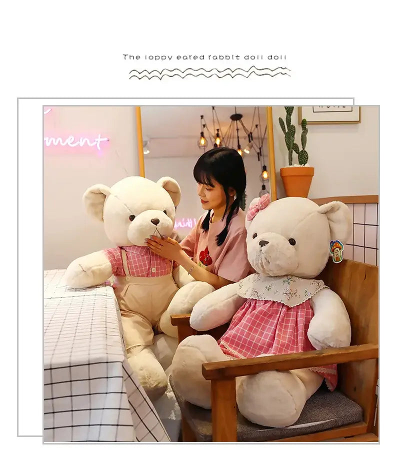 Soft white plush toys featuring a couple bear plush dressed in pink and beige outfits perfect as christmas gifts