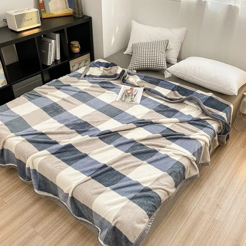 Blue and cream decorbites cozy checkered fleece blanket with soft texture ideal for bedroom throw use