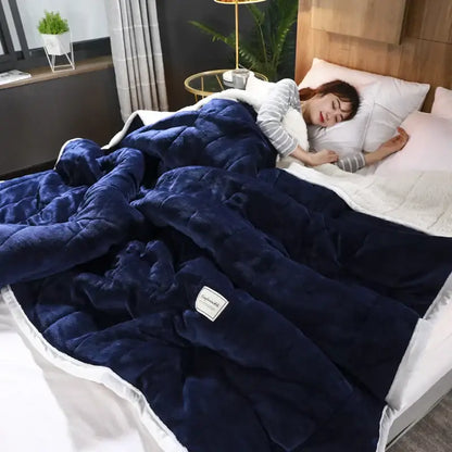 Cozy coral fleece navy blue plush quilt with white inner lining and label for bedroom decorbites cozy coral use
