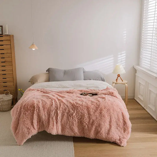 Pink cozy faux fur throw blanket with soft fluffy texture ideal for bedroom decorbites cozy faux style