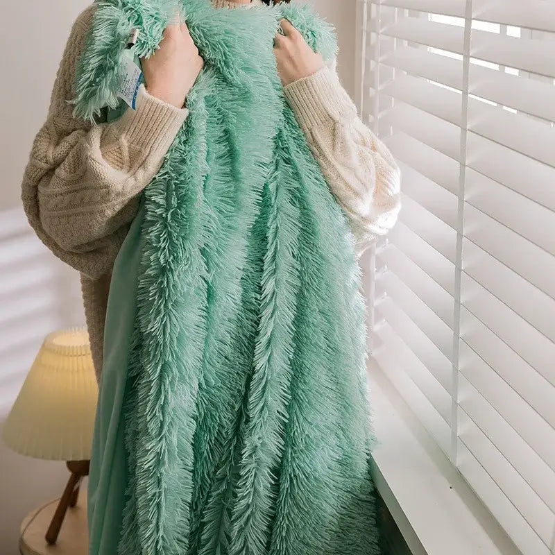A plush mint green cozy faux fur throw blanket with soft shaggy texture perfect for pink bedroom decorbites cozy faux use