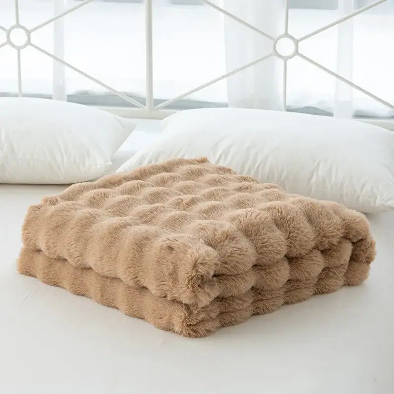 A cozy faux rabbit velvet tan plush throw blanket with quilted bubble texture for bedroom decorbites cozy faux use