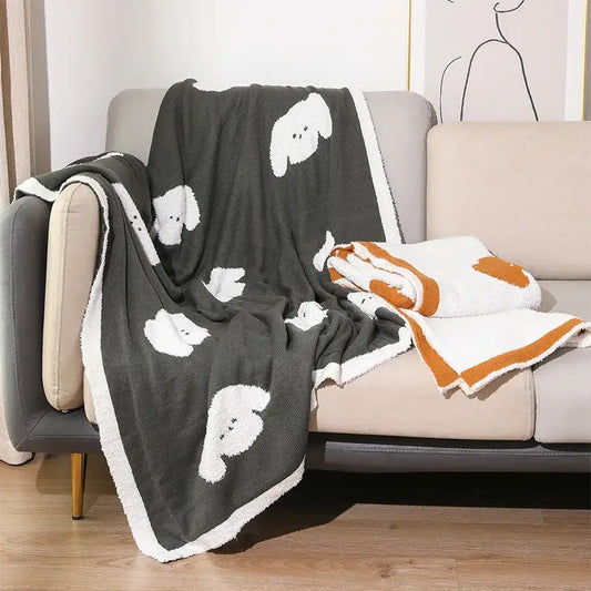 Dark gray decorbites cozy flannel blanket with white puppy faces and white fleece border for bedroom decor