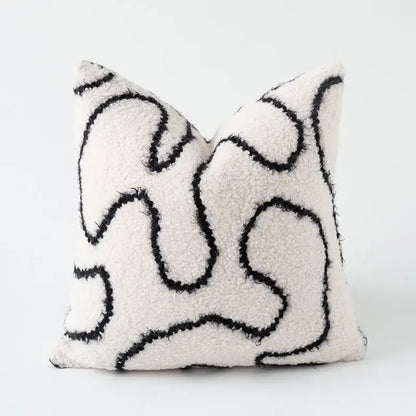 Cream-colored plush teddy bear style pillow cover with bold black abstract line art for decorbites cozy green decorbites cozy green handmade decor