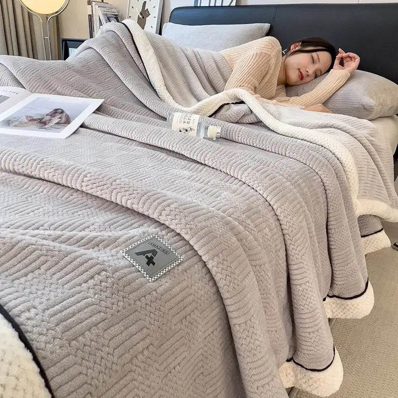 Beige plush throw blanket with textured quilted pattern and white fleece lining for decorbites cozy striped velvet bedding