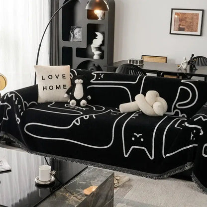 Black chenille sofa cover with white outlined cartoon cat patterns and fringed edge for living room use