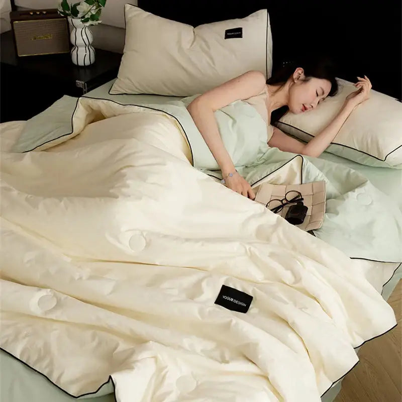 Cream and black ice cream cool feel summer quilt bedroom set with cream-colored quilted duvet and black piping decorbites ice cream