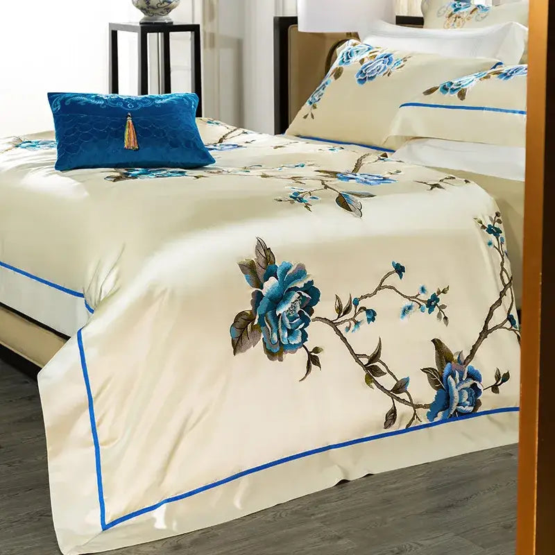 Cream and blue 200s embroidery egyptian cotton bedding set with cream satin and intricate blue floral embroidery
