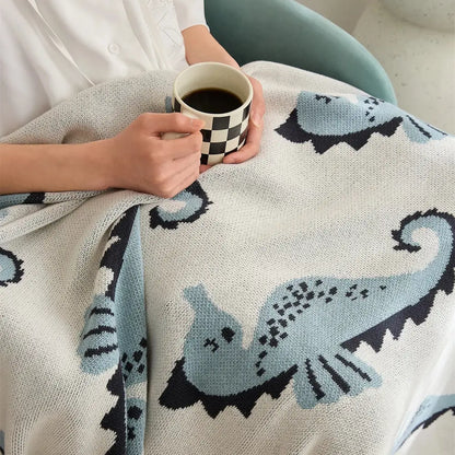 Cozy cream and blue cute sea horse cotton blanket featuring knitted seahorse designs for bedroom decorbites decor