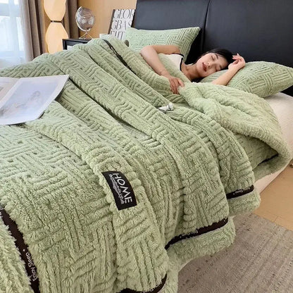 Soft mint green decorbites fluffy fleece blanket with textured woven pattern and black trim for bedroom decor