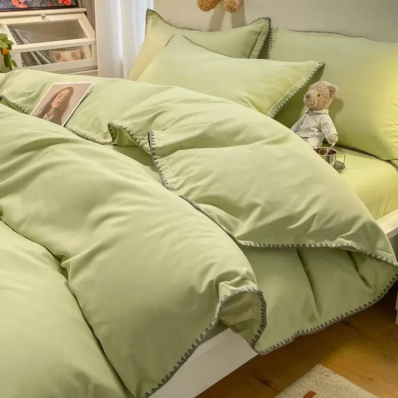 Soft mint green bedding set with subtle gray zigzag stitching and cozy shell edges by decorbites cozy shell