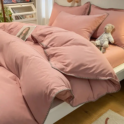 Pink quilted duvet bedding set with subtle gray stitching and decorbites cozy shell edges for bedroom comfort