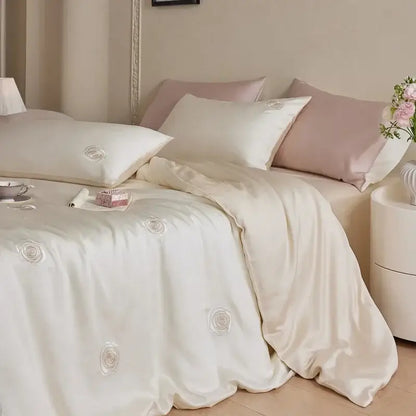 Cream satin duvet cover with delicate embroidered rose motifs in cream and green decorbites cartoon embroidery comforter set