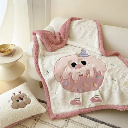 Cream cartoon lamb wool blanket with plush cream color and pink frosting donut appliqué for bedroom decorbites use