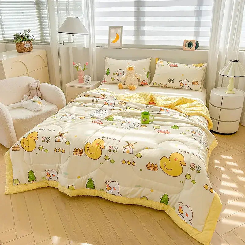 Cream cartoon pattern summer quilt featuring a soft plush texture with playful yellow duck decorbites cartoon pattern design