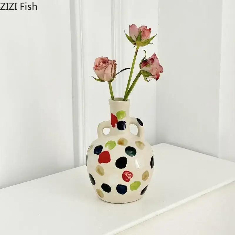 A cream colorful dot ceramic pitcher vase with two handles for kitchen floral decor by decorbites colorful dot