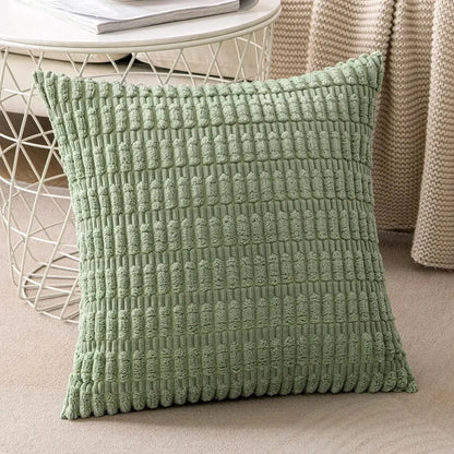 A soft sage green textured throw pillow with raised woven pattern for decorbites corduroy striped pillow covers