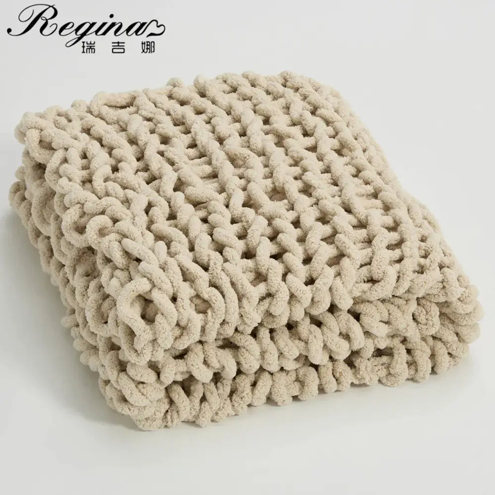 Beige chenille chunky knit throw blanket with a soft textured surface from decorbites cozy chenille bedroom decor