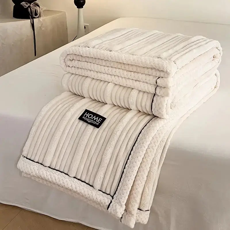 Cream cozy faux rabbit plush blanket with ribbed texture and black stitched trim for decorbites cozy faux bedroom use