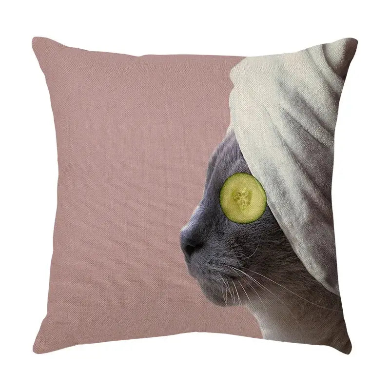 Cream dusty rose square face decorative cushion featuring a cute cat face with towel and cucumber for living room